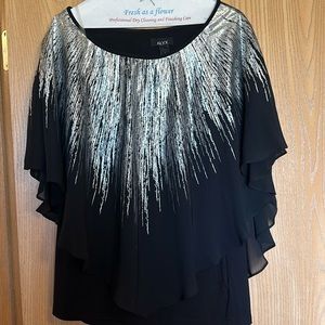 Like new!   Flowy dressy shirt!